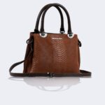 Women's hand and shoulder bag with crocodile surface